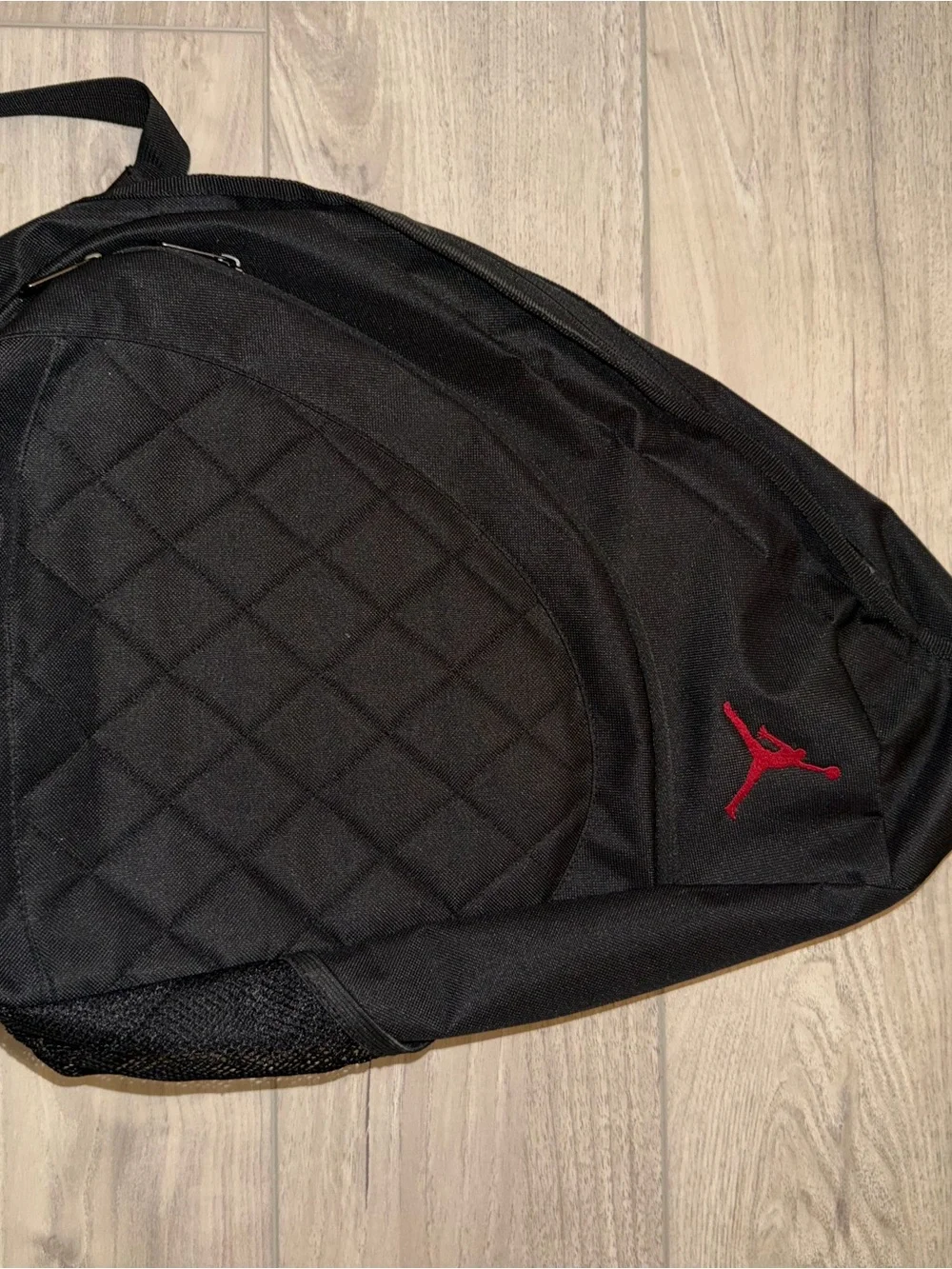 Jordan Black Quilted Sling Backpack with Red Jumpman
